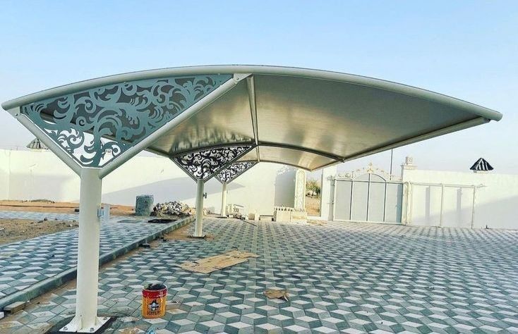 مظلات سيارات كابولي جدة الاهتمام بالقماش أو الألواح